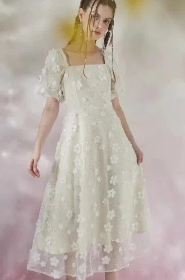Tela de vestido de lentejuelas florales con cuentas de moda